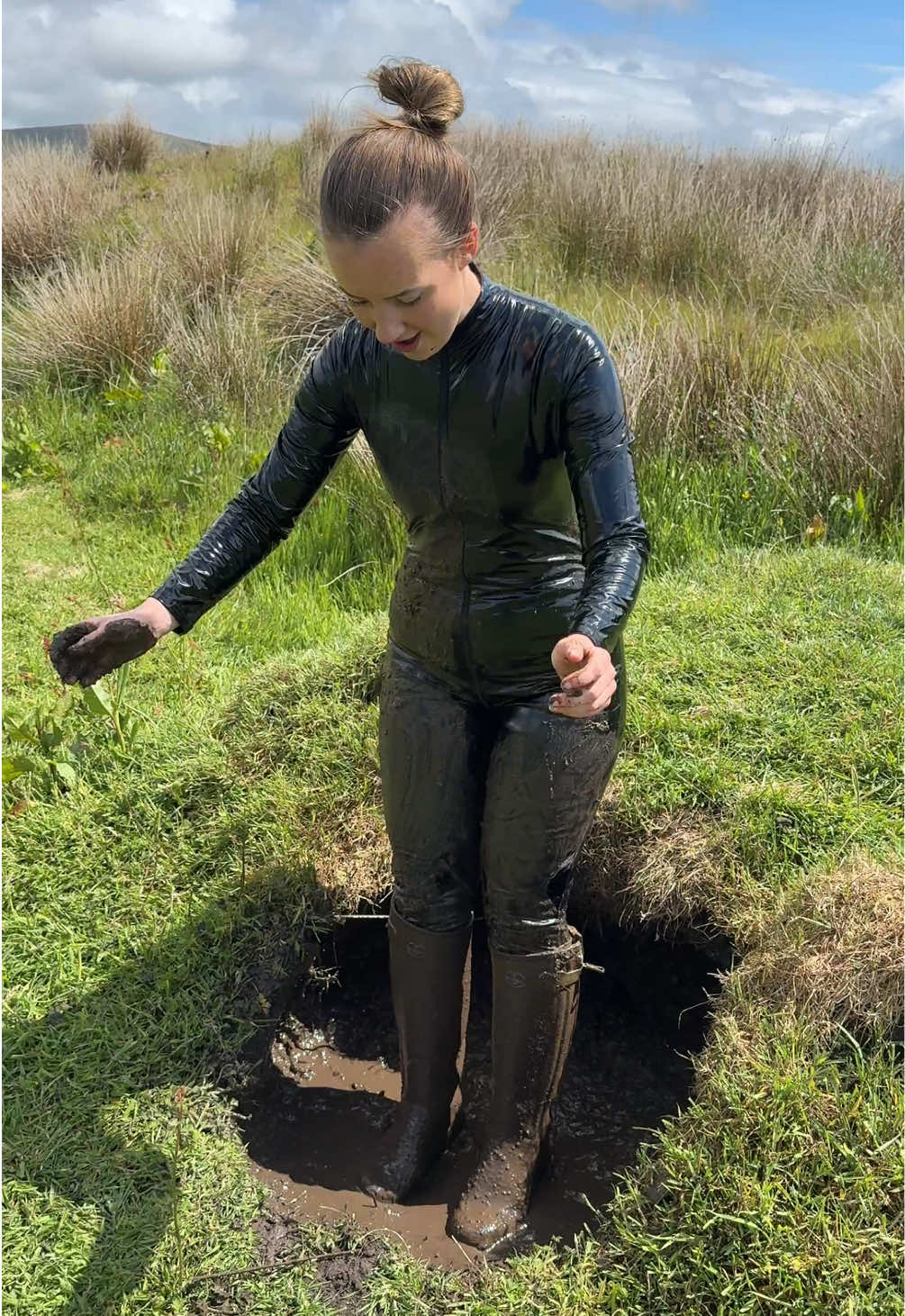 A post by @charlottelilyofficial on TikTok caption: Jumping in the mud in wellies