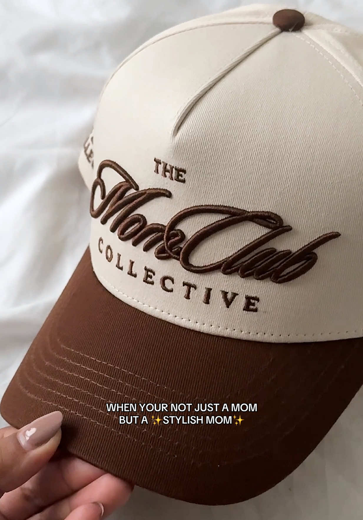 A post by @bettyyannhill on TikTok caption: This hat is PERFECTION 🤎🤎🤎 how beautiful is the brown & the pop out text 😩 a mom must 🤌🏽 #hatfashion #hatstyle #truckerhat #baseballhat #momfashion #momhat #momclub #tiktokshopcreatorpicks #momclubhat #brownaesthetic #dealsforyoudays 