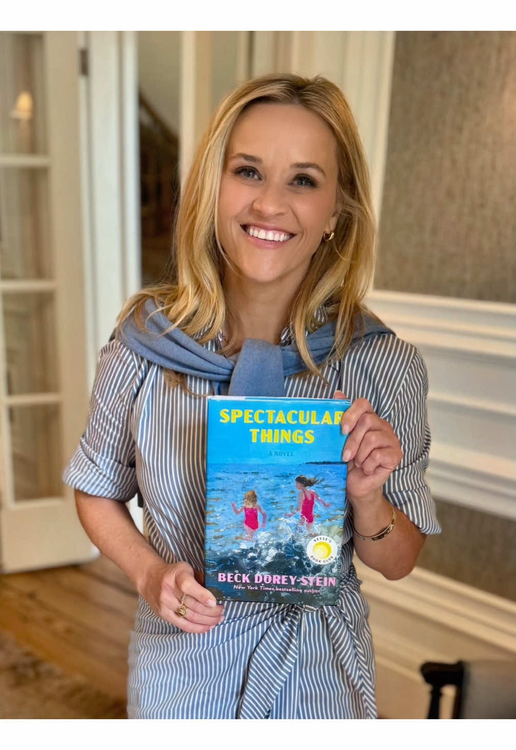 A post by @reesewitherspoon on TikTok caption: Kicking off July with our newest @ReesesBookClub pick! ⚽️💕 "Spectacular Things" by Beck Dorey-Stein follows sisters Mia and Cricket as they navigate an impossible choice that will change everything. Think sisterhood, sacrifice, and the golden age of women's soccer all wrapped into one epic story.