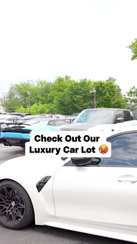 A post by @georgejsaliba on TikTok caption: The lot's looking clean. Check it out. #luxurycars #bmw #carenthusiast #supercars #carforsale #fy #fyp 