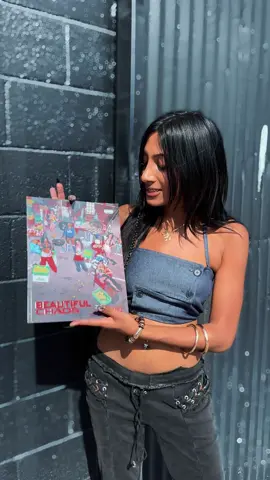 A post by @katseyeworld on TikTok caption: touch me again and you'll find out exactly who I am… #KATSEYE #KATSEYE_Lara #KATSEYE_BEAUTIFULCHAOS #BEAUTIFULCHAOS