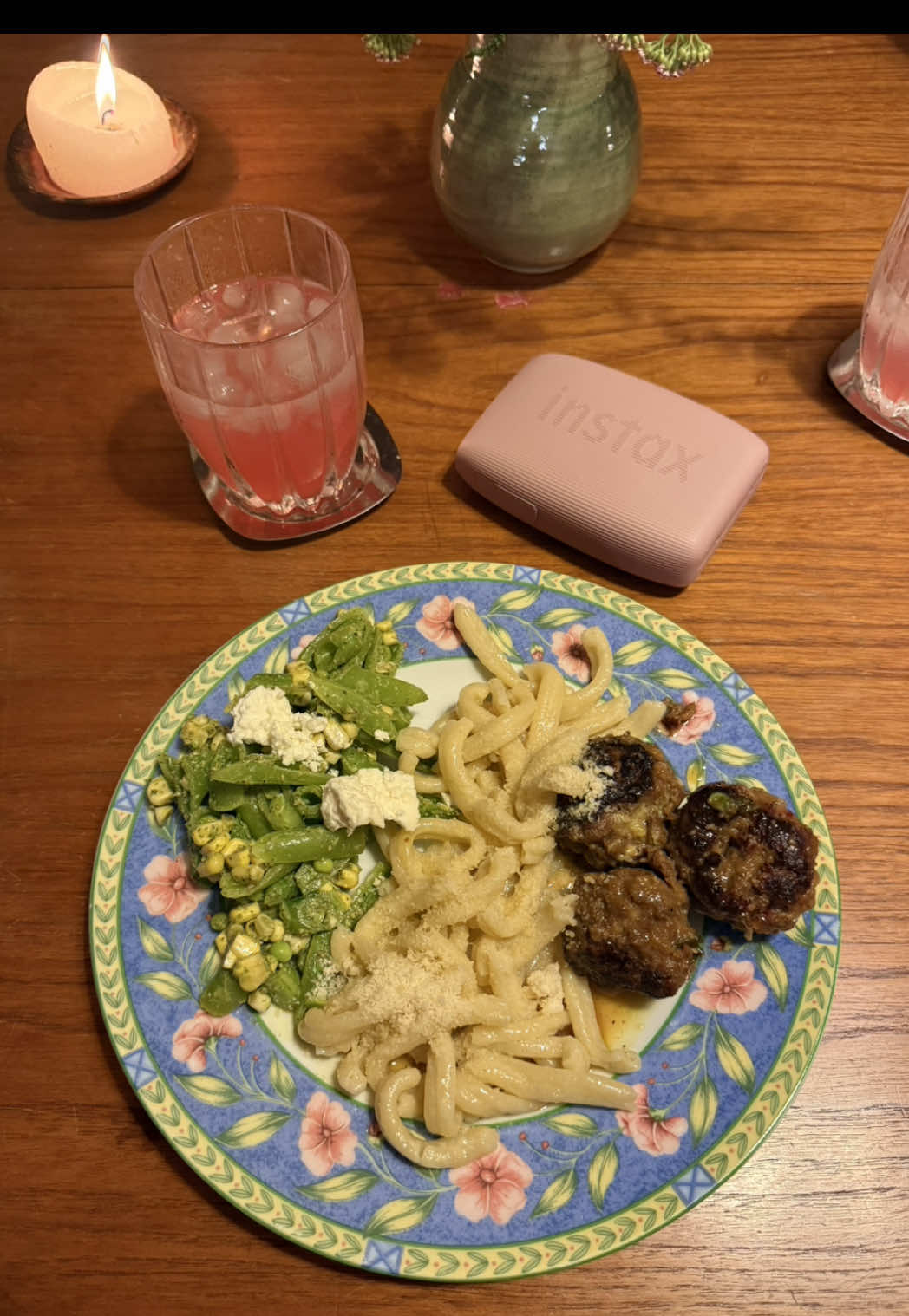 A post by @brialem on TikTok caption: Host a summer dinner party with me using my @Instax mini Link 3! ✨ #instaxpartner #printedwithinstax 