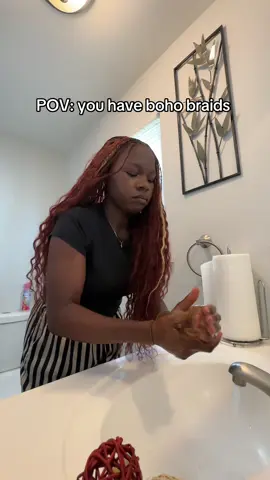 A post by @midahair on TikTok caption: All of a sudden my hair has become my paper towel  #humanhairbraids 
