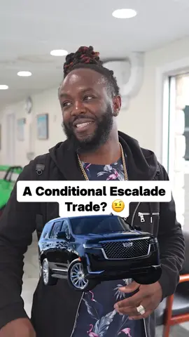 A post by @georgejsaliba on TikTok caption: OG customer hit us with something hilarious mid Escalade negotiation. #cardealership #carbuying #cartrade #luxurycars #autodeals #fy #fyp 