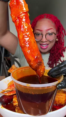 A post by @kie_eats on TikTok caption: Made a seafood boil with king crab 🦀 snow crab, potatoes, sausage, and corn. Also trying the Strawberry Vanilla @OLIPOP from Sam's Club Olipop Variety Pack #olipoppartner Seafood Boil Mukbang