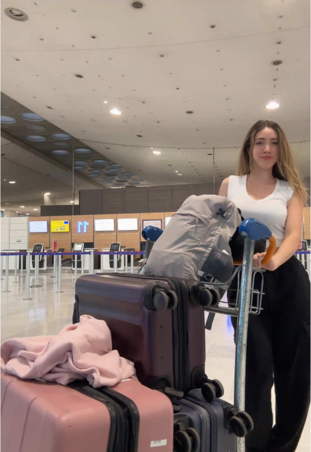 A post by @paulinat on TikTok caption: Packing light🤩🤩>> also ignore my hair 💀 #travel #vacation #packing #eurosummer 