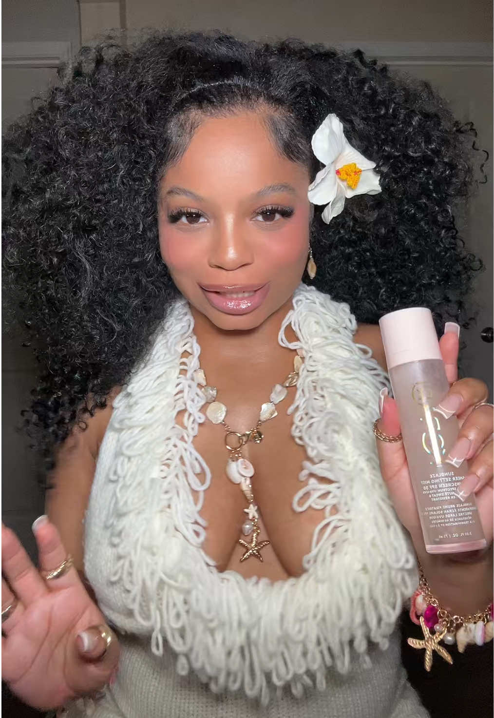 A post by @taylortimetv on TikTok caption: My favorite spf50 sunscreen setting spray doesn’t mess up my makeup, makes my skin glowy, and keeps me protected from the sun uv rays makeup setting spray that leaves no white cast and can be reapplied @Kopari Beauty #dealsforyoudays #settingspray #spf50 #spfmakeup #spf #sunscreenreview #blackgirlskincare #nowhitecastsunscreen #luxurybeauty #koparibeauty 