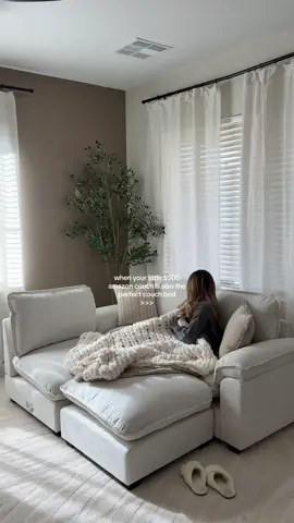 A post by @itschelseahope on TikTok caption: No need to spend thousands for a cozy couch bed moment #amazonmusthaves #amazonfinds 