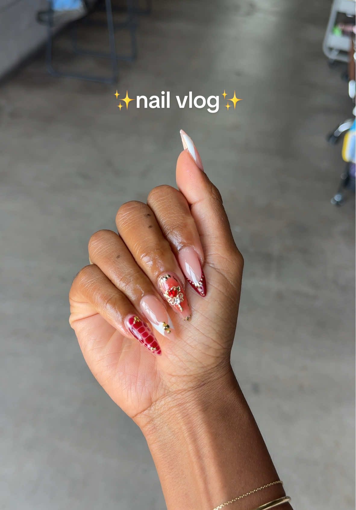 A post by @courtneysarracino on TikTok caption: so obsessed with how these ones turned out😍🌹💋💃🏽✨ @NAILSSBYBRIANAA 🫶🏾 #nailvlog #nailday #nailinspo #almondnails #naildesigns #nails #nailart 