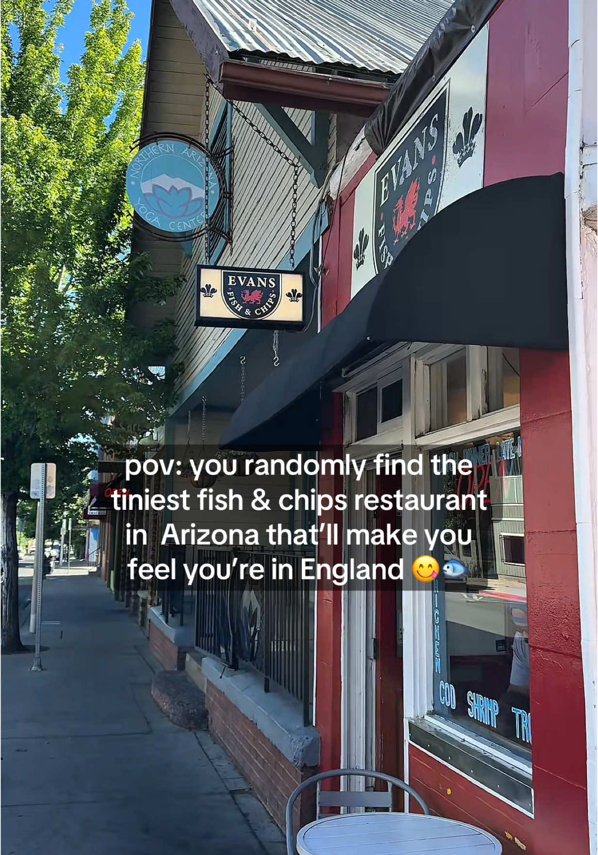A post by @wildjoyexperiences on TikTok caption: THE CUTEST LIL SHOP 🥹 best fish and chips in Arizona!!!! It’s the tiniest little restaurant called Evan’s Fish and Chips in Flagstaff only 2 hours from Phoenix 👀 it’s so small!!!! Anyone been?! You have to get the sticky toffee pudding… grab your food and you can walk to the city center or the small tables in the alley by the shop… You have to go!!! #arizona #arizonafood #england #fishnchips #fishandchips #flagstaff #flagstaffaz #holeinthewall #azfoodie 