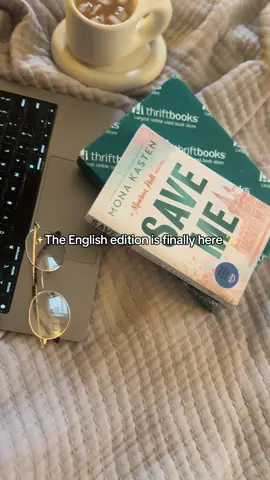 A post by @thriftbooks on TikTok caption: Being able to read about one of our favorite couples without having to take up German lessons? You can bet we’re swooning. Discover where it all began with the new English translation of Save Me by Mona Kaston, available at ThriftBooks. #thriftbooks #readersgonnaread #readerlife #BookTok #maxtonhall