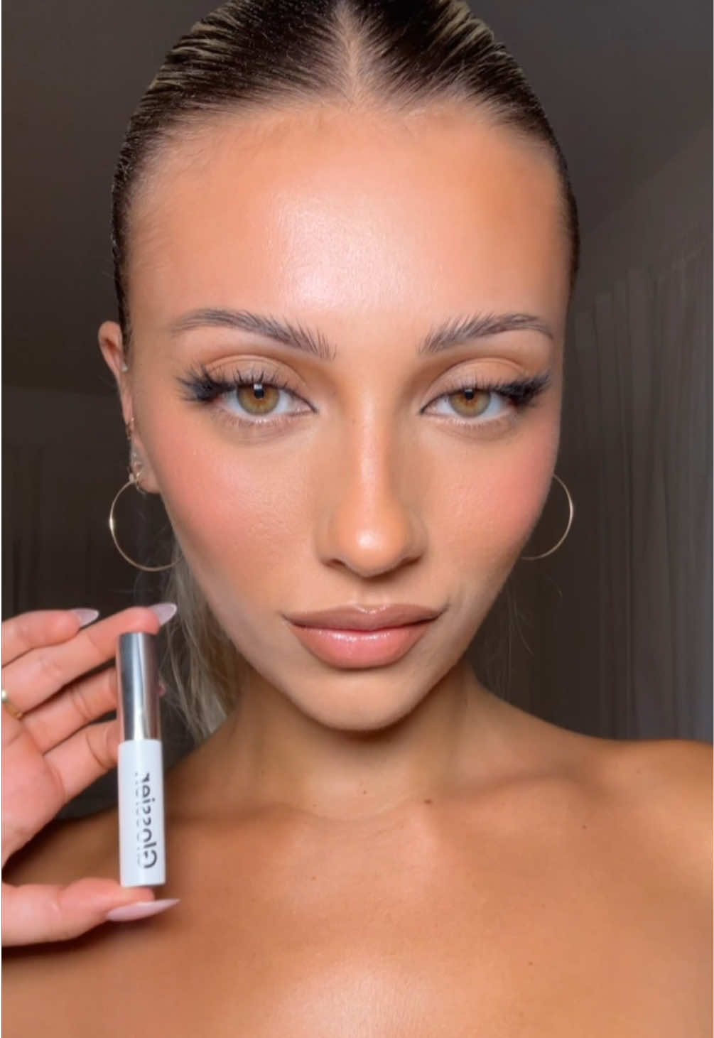 A post by @alexisfrasca on TikTok caption: snatchural brows using boy brow arch in shade cool blond and boy brow in clear #glossierpartner @Glossier @sephora #glossier #sephora