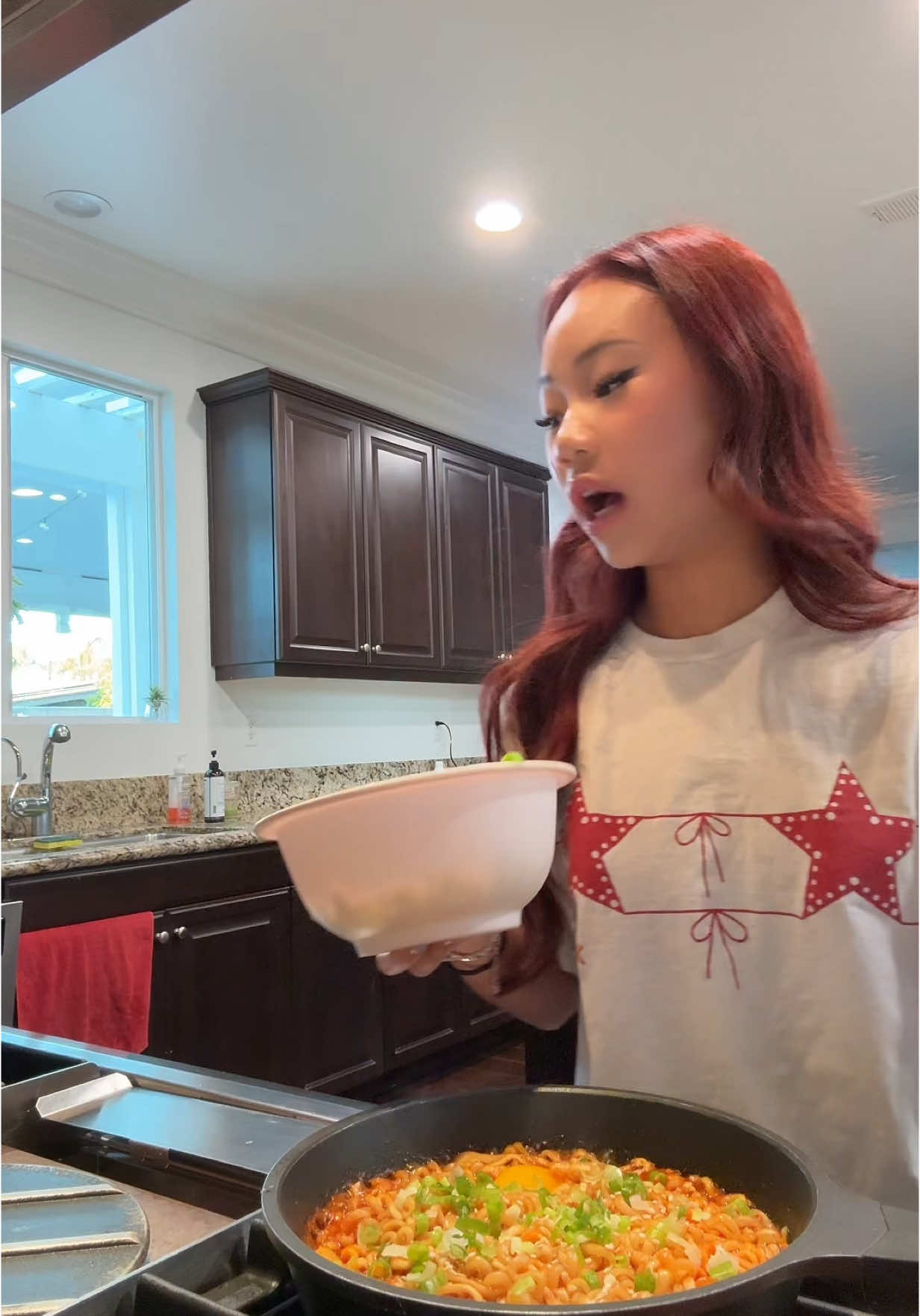 A post by @sanguyenn on TikTok caption: 2x buldak spicy ramen recipe