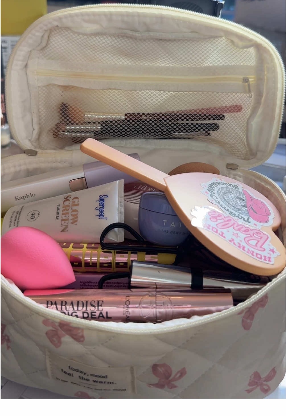 A post by @smalltownbeautybytess on TikTok caption: Makeup Bag for the beach👛🏝️🌊💄#makeup #packing #beauty #summer #summervibes #beach #vacation #fyp #momsoftiktok 