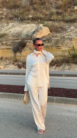 A post by @maebestore on TikTok caption: Dressing for the moments that matter.  Perrie Sian wearing the Mini Pleat Vacation Co-Ord in Cream. 