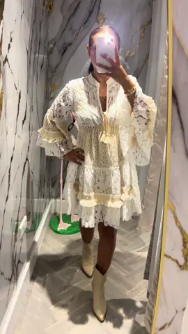 A post by @essexcouture on TikTok caption: Most gorgeous dress ✨😍🤍 #essexcouture #boho #cowboyboots #ibiza 