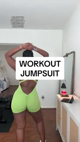 A post by @ on TikTok caption: Jumpsuit is @EnfinitiAf Afleisure. What I love is that no matter how much I sweat, it doesn’t show. And it’s sexy, hello! #blackownedbusiness #Workout #ThickFit #WorkoutSet #WomenInTheir30s. 