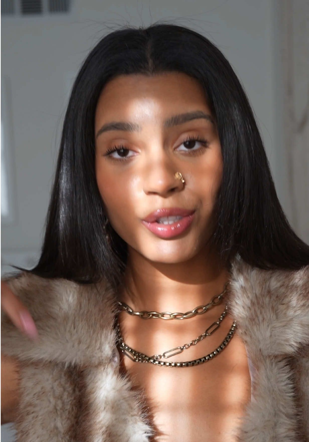 A post by @christineobanor on TikTok caption: Curly vs straight hair Christine are 2 different people 