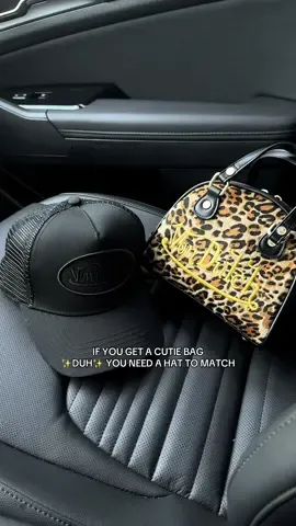 A post by @bettyyannhill on TikTok caption: This DUO right here 😭❤️‍🔥❤️‍🔥❤️‍🔥 I am literally in love with this bag & hat together! Treat yourself 🤌🏽 Grab you a bag & a hat to match 👏🏽 #vondutch #vondutchhats #vondutchbowlingbag #vondutchbag #vondutchstyle #tiktokshopcreatorpicks #truckerhatstyle #bowlingbag #fashiontok #fashioninspoforyou 