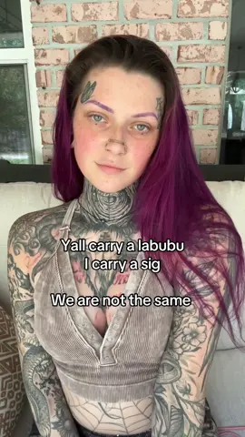 A post by @miss.spider.legs on TikTok caption: I don’t understand the hype but you do you. #spiderlegs #yallternative #inkedup #sig #labubu #trending #relatable #foryoupage #fyp #inked #bluecollar #viral 