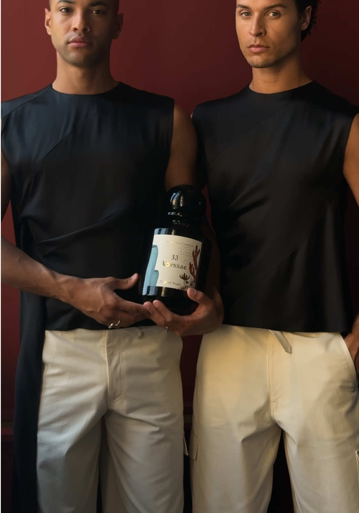 A post by @theoandremy on TikTok caption: Sweet escape for 33 Abyssae with @L’ARTISAN PARFUMEUR #abyssae #matchingoutfits #theoandremy 