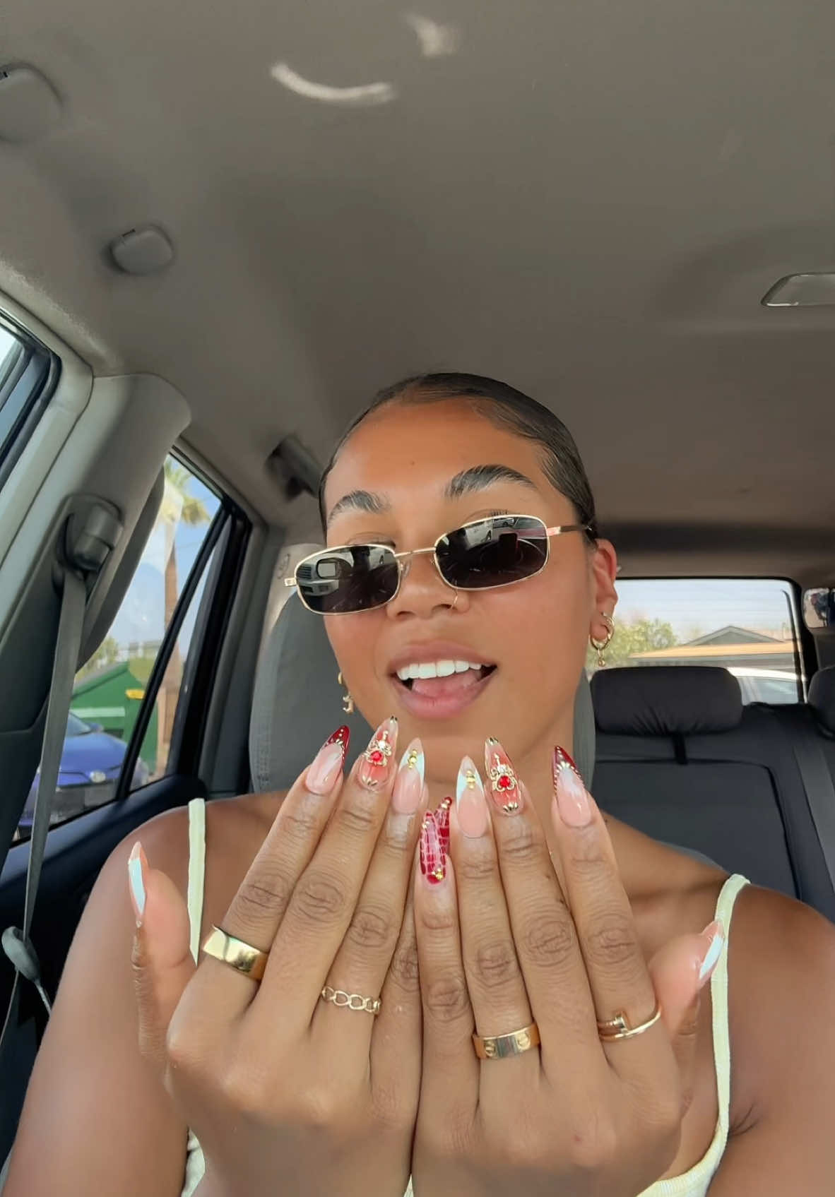 A post by @courtneysarracino on TikTok caption: I have my claws back😌🌶️❤️💥❣️✨ #nailinspo #naildesigns #almondnails 