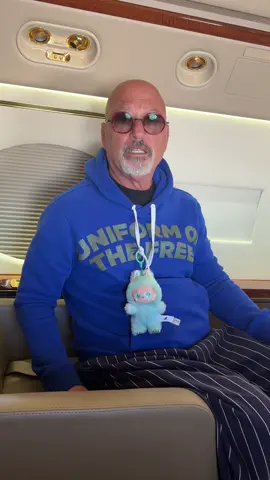 A post by @officialhowiemandel on TikTok caption: #travel #labubu 