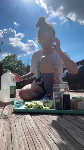 A post by @warshragss on TikTok caption: A southern treat🥒 #southern #appalachia #food #snack #summertime #cucumber #onion #vinegar #tn #porch 