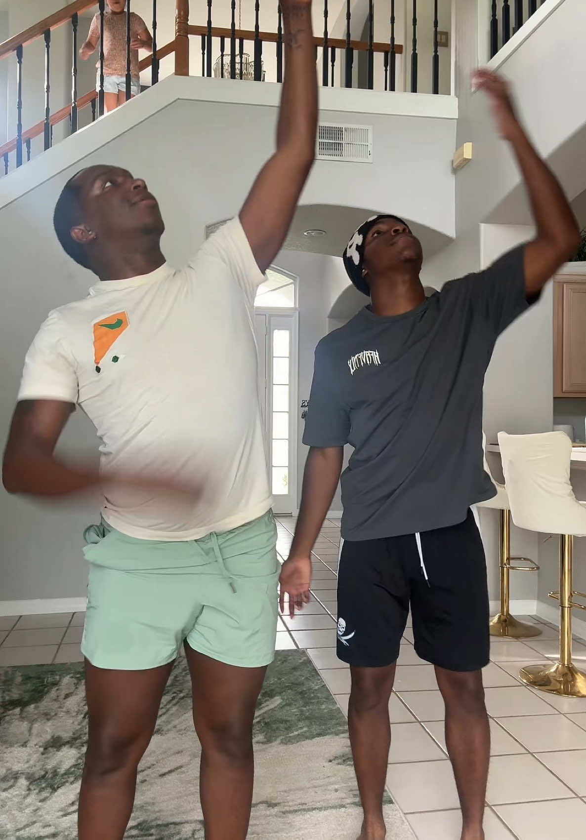 A post by @markellwashington1 on TikTok caption: @nØtlike.dj ✪ came to visit the fam and me and my lil twin had to hit this dance !! How is my lil brother taller than me 