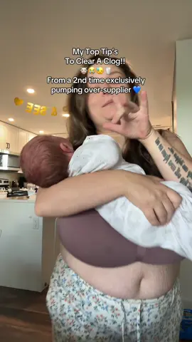 A post by @loreleiwilfong on TikTok caption: Ugh! It happend, one month postpartum I started to feel a clog come on 😭 I missed a pump when little man let me sleep a bit longer than my body thought I should have 😅 Luckily at this point I know the drill.. Pump, Shower, Pump & HYDRATE! & repeat the cycle until you get relief! It only took one shower and pump and I had loosened the clog! #oversupply #fyp #motherhood #postpartum #milksupply #pumpingmom #oversupplier #breastfeedingtok 