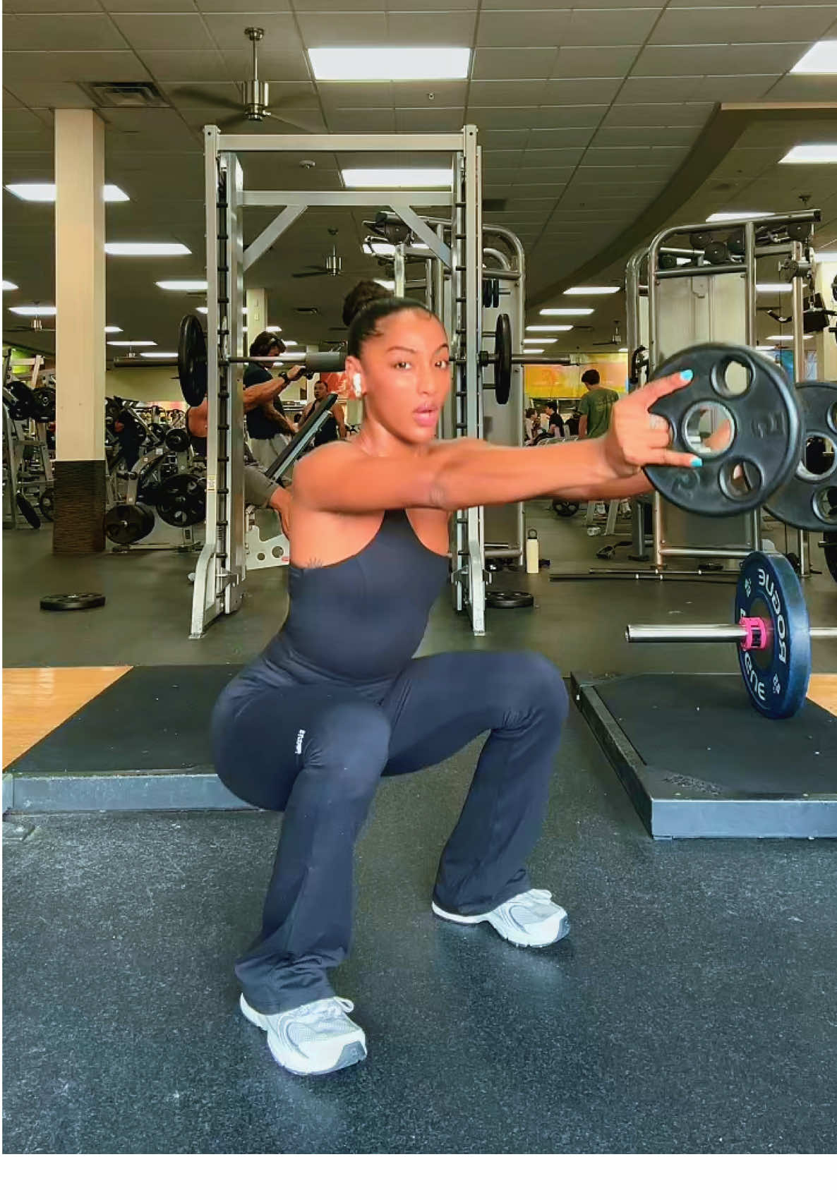 A post by @official_janina on TikTok caption: Do you think you could do this squat challenge?