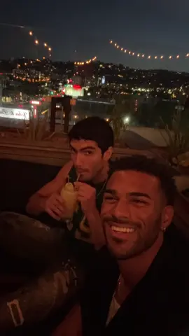 A post by @findjeremiah on TikTok caption: Look who I ran into 👀🐐 @Charlie Georgio #loveislandusa #loveislandjeremiah #fyp #trending #charlie #britishmate #hedidnotbitemyfinger #hollywood 