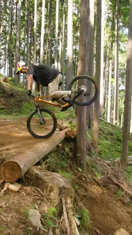 A post by @redbullbike on TikTok caption: cause dropping in forwards is 🥱 @TOMOMI 忍者ライダー #mtb #mountainbiking #mtblife #bikelife 
