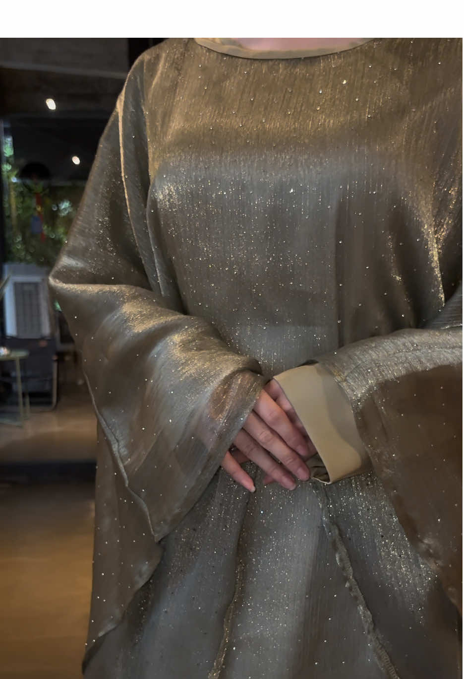 A post by @clfashionuk on TikTok caption: Hide the starry sky in abaya. #sunmer #sunmeroutfit #July #cheongsam #fyp #abayastyle #OOTD#muslimah ##Luxury#beauty#arabic#bangladesh#ModestFashionUK #BritishMuslimStyle #EidInLondon #HalalFashionRevolution#clfashionnew #ramadan2026 