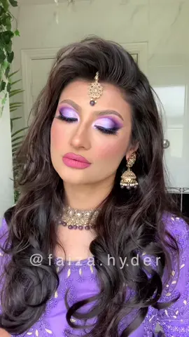 A post by @faizamakeupartistry on TikTok caption: Lilac glam @PINKHONEY flex hold honey glue @Anastasia Beverly Hills dip brow pomade Dark brown @PLOUISE cosmetic paint 03 @beautyglazed color board eyeshadow palette @TTDeye Colored Contact Lens Real Khaki lenses @Makeup Revolution lipstick Glorified #makeuptutorial #makeupartist #makeuptransformation #onthisday 