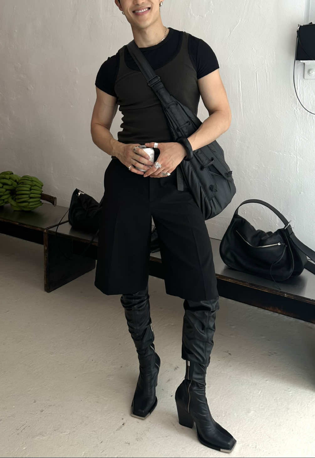 A post by @theedwardpark on TikTok caption: No one does it like @The Peter Do 🖤 On my way to the Peter Do Club pop-up last weekend #fitcheck #fyp #tanktop #thighhighboots 