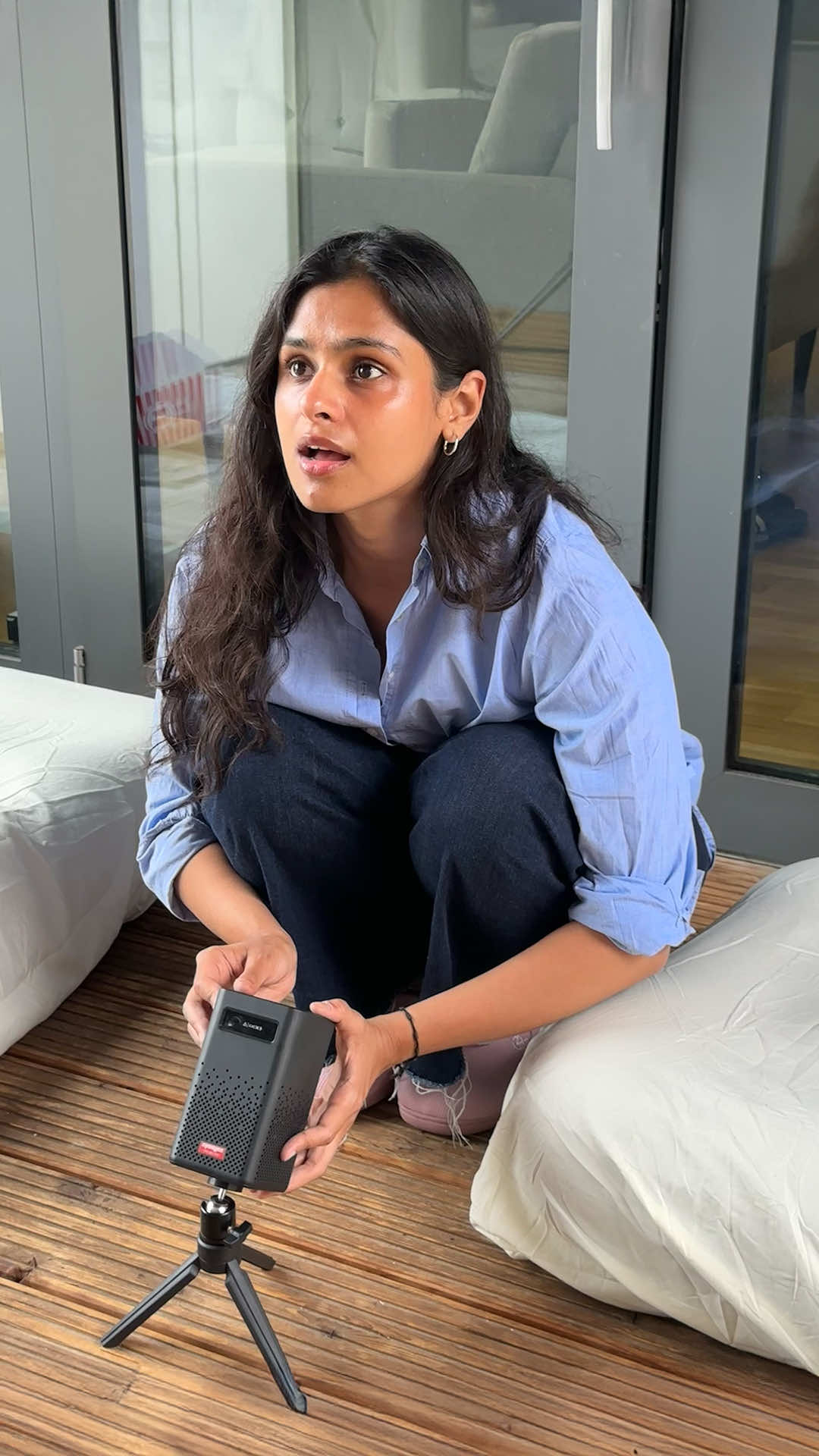 A post by @ebay_uk on TikTok caption: #AD | @ananya | New in London said movie nights without the blockbuster budget 👀  Challenge accepted ✅  It’s open cinema season and Ananya’s bringing the glorious vibes of summer right at home with a nostalgic twist to cherish new memories and old ✨ 🍿 #eBayUK #Preloved #OpenCinema #ThemeParty #LivingAbroad #NostalgiaCore