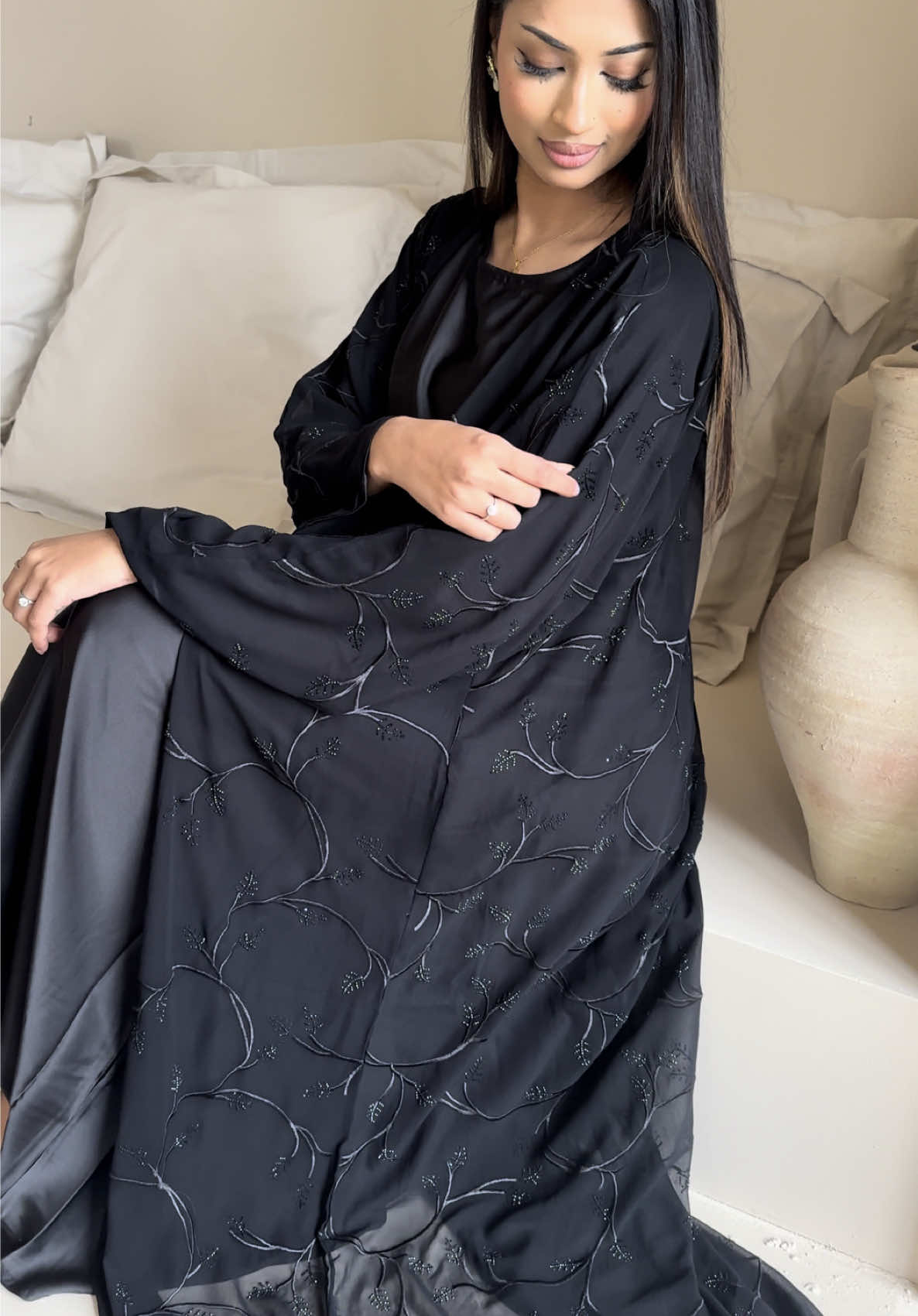 A post by @siaabayas on TikTok caption: Black on Black 👀 #fyp #fypシ゚ #fashion #modestfashion 