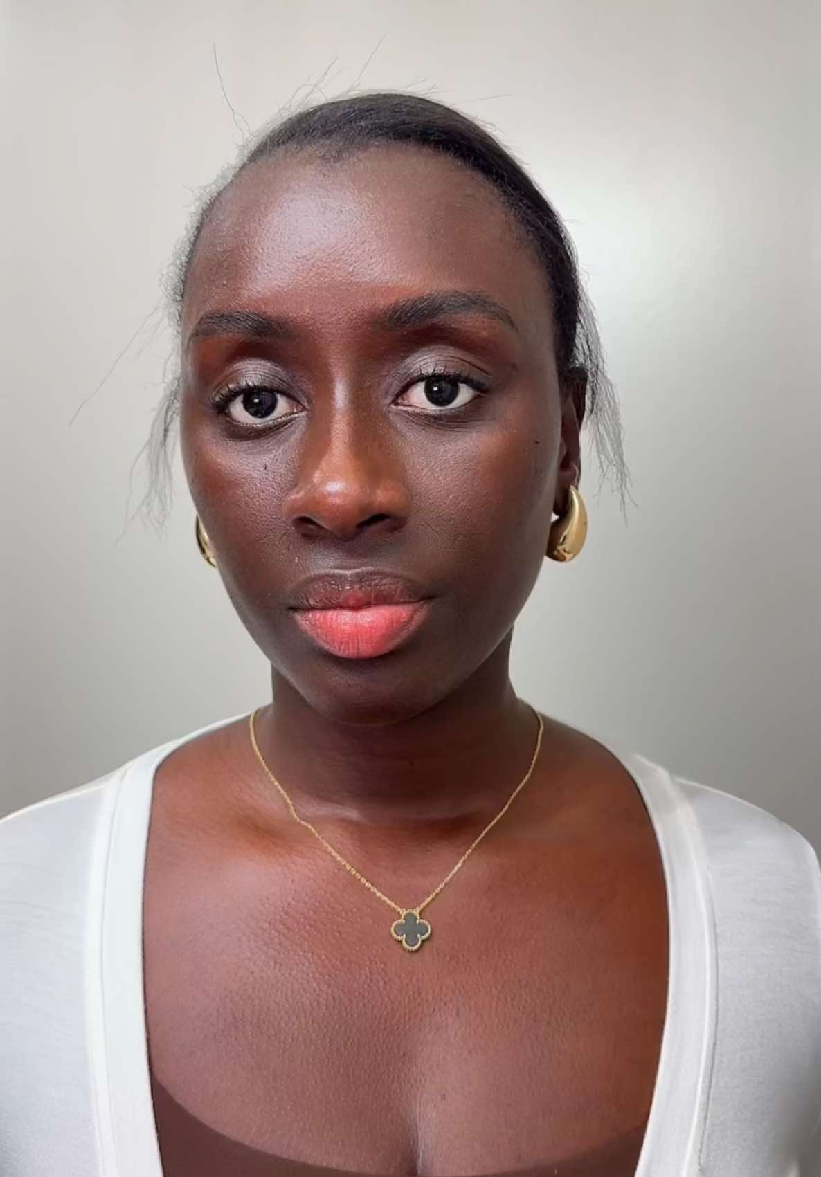 A post by @ on TikTok caption: Some of my favorite products to get ready with before a hot girl walk.  #hotgirlwalk #grwm #blackgirlluxury  • • • @EADEM @Clarins USA @urban decay @Lancôme @Supergoop 