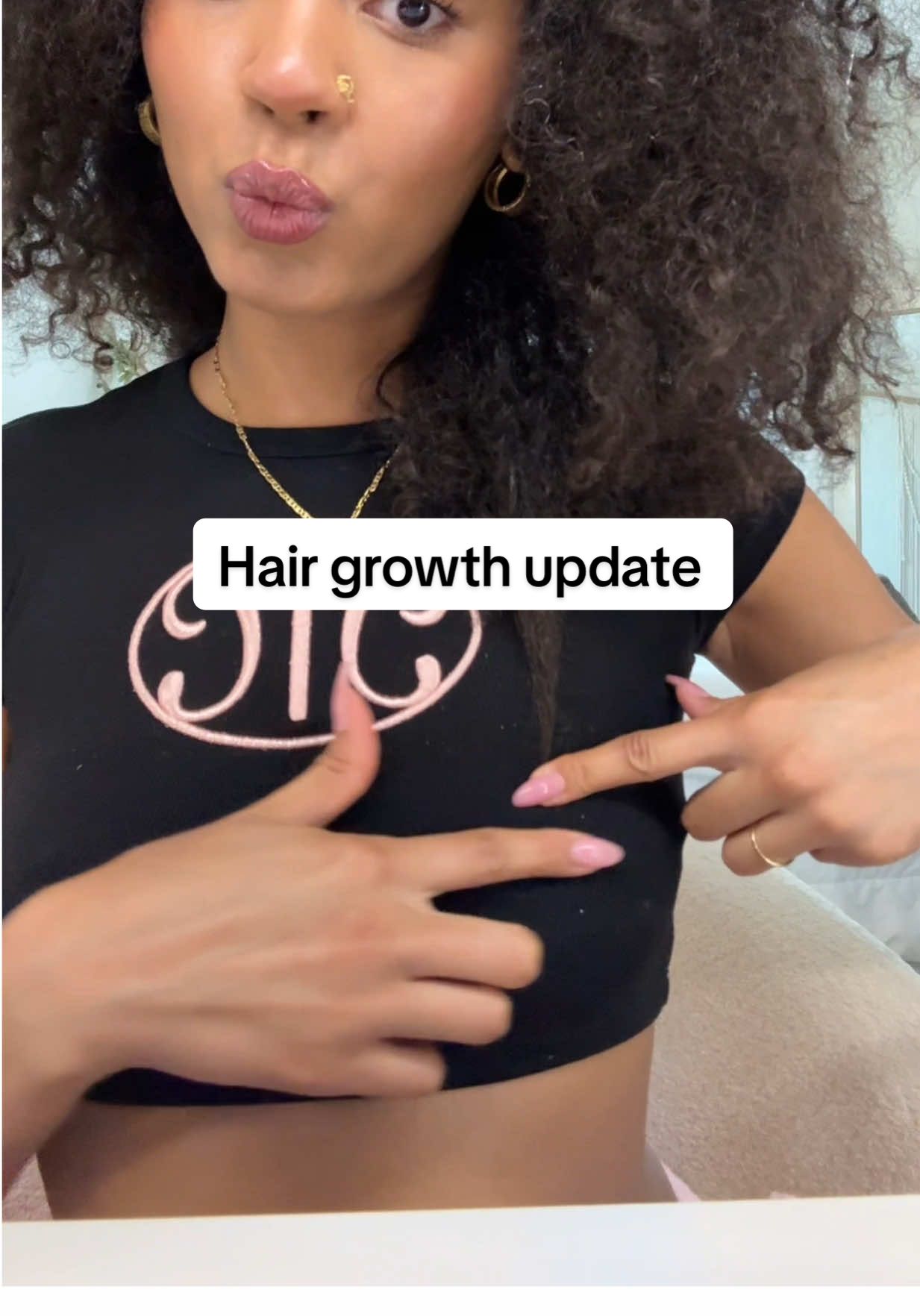 A post by @christineobanor on TikTok caption: *5 month length check. I only used  *3 bottles total inconsistently. My hair grew 