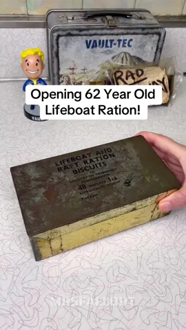 A post by @mrs.fallout on TikTok caption: Opening a 62 Year Old Lifeboat Survival Ration! If you look closely you can see the stamp on the front which indicates this survival ration is from the British Cunard SS Queen Mary Ship from the early 1960’s! This ration tin contained 48 biscuits which were basically calorie-dense and easily digestible crackers. #fallout #mrsfallout #fallouttok 