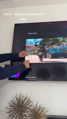 A post by @sonyelectronics on TikTok caption: Our BRAVIA 8 II keeps you well fed with stunning visuals and immersive sound 🔊🎶 — the ultimate upgrade to your home entertainment setup! 📺