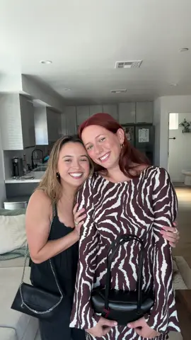 A post by @raelyn_cs on TikTok caption: Wish my girlfriend a happy birthday and tell her how pretty she looks... or else 👊🏼💥 Happy birthday to my favorite girl!!! Wishing you the best last year of your 20's & pinching myself that I get to laugh with you day in and day out <3 Cheers to 29!! @Cait Kearney  Dress: @@Réalisation Par Top: @@Free People Jeans & flats: @@ZARA Purse: @@HEAVEN MAYHEMx @@Freja NYC