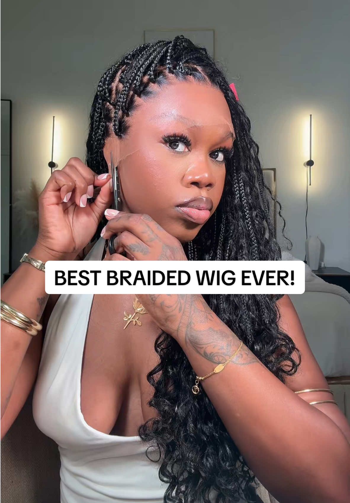 A post by @ebonyrosaa on TikTok caption: I’m still shook at how bomb this looks😩 @Luvmehair link in my bio 🥳 use code “eb01” for $$ off #luvme #luvmehair #luvmeforyou #knotlesswigs #braidedwig #dealsforyoudays 
