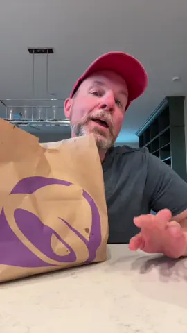 A post by @anidaslajaunie on TikTok caption: Blacked out in the @tacobell drive thru once again #tacobell #fastfood #mukbang #eatwithme 