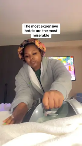 A post by @taylorbnice on TikTok caption: Like why do you have a safe and not a microwave?  #hotel #hotellife  #luxury #luxuryhotel  #ironing  #robe #vacation 