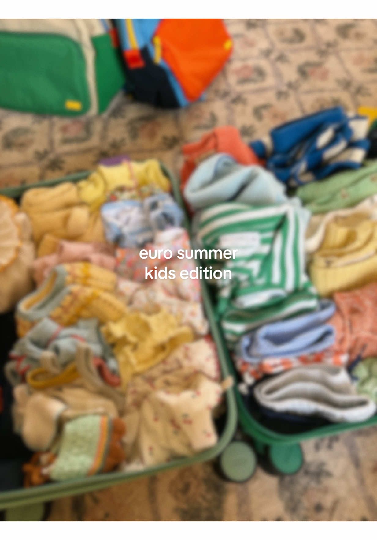 A post by @emilyfranciswheaton on TikTok caption: see you soon, São Miguel! 🌞 #packwithme #summervibes #eurosummer #europewithkids #travellingwithkids #portugalwithkids @away @minnow @saltwatersandals @Misha & Puff @Spilled Milk @Pehr @Briar Baby @kytebaby 