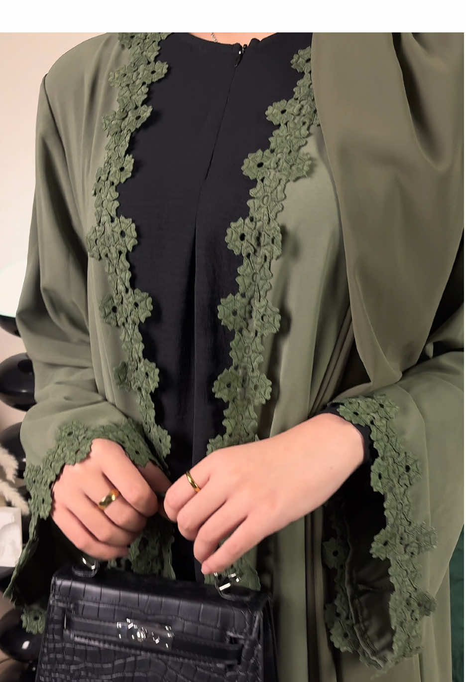 A post by @clfashionuk on TikTok caption: The green lace jacket exudes tenderness. #sunmer #sunmeroutfit #July #cheongsam #fyp#Luxury#beauty#arabic#bangladesh#ModestFashionUK #BritishMuslimStyle #EidInLondon #ramadan2026 #HalalFashionRevolution#clfashionnew 