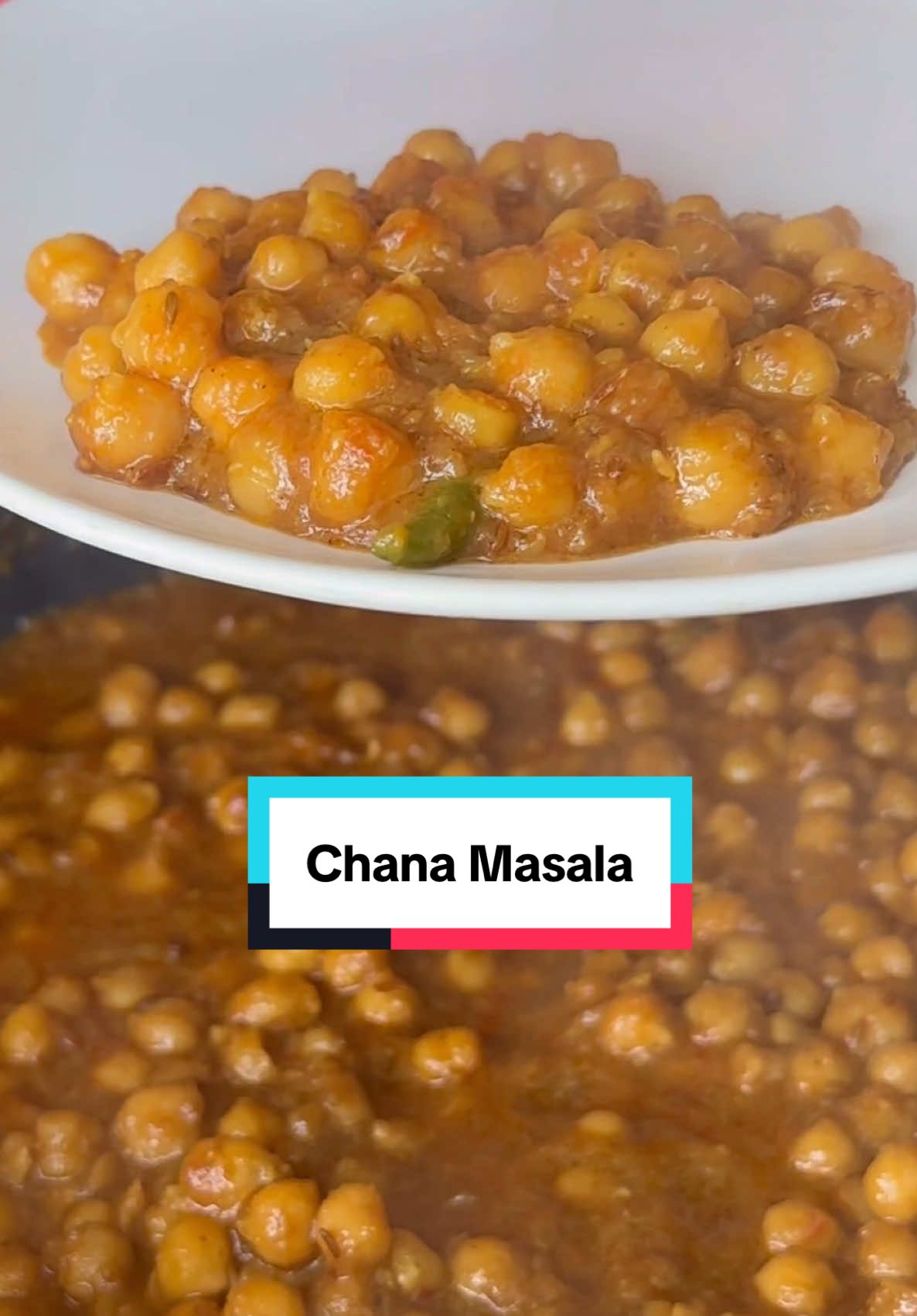 A post by @kauscooks on TikTok caption:   Chana Masala Recipe  Whether you call them cholay, channay or chana masala, one thing’s for sure - they’re absolutely delicious and SO underrated! Made even easier (and extra tasty) with @Shan Foods Global [ad] ✨  ✱ Ingredients: - 4-5 tbsp oil or ghee - 1 tsp whole cumin seeds - 3 cardamom pods - 2 black peppercorns - 1 black clove - 1 bay leaf - 2 medium onions - 1 tbsp garlic paste - 1 tsp ginger paste - 2 ½ tbsp Shan Chana Masala - 4 tomatoes - 3 cans chick peas, drained - 400ml water (one can) - 1 tsp red kashmiri chilli powder (optional) - 2 green chillis (optional) - 1-2 tbsp chopped coriander for garnish ✱ Method 1. Heat the oil in a pan over medium heat. Add the whole spices and cook for about 1 minute until fragrant. Add the finely diced or blended onions and cook for 3-4 minutes until softened. 2. Stir in the garlic and ginger paste, followed by the Shan Chana Masala. Sauté for about 5 minutes until the mixture darkens in colour. 3. Blend the tomatoes, then add them to the pan along with the green chillies (if using). Bhun (cook down) for 8-10 minutes until a thick masala base forms. 4. Add the chickpeas, refill one of the can’s with water and add this in too. Remove about ½ cup of chickpeas, blend until smooth in the same blender used for the tomatoes and stir back into the pan. 5. Simmer on low for 10-15 minutes, adding more water if needed to reach your desired consistency. Garnish with fresh coriander, a squeeze of lemon juice and enjoy hot with paratha, puri, naan, or over rice. #chanamasala #cholay #chickpeas #curry #recipe #ShanFoods #ShanSamplingUK 