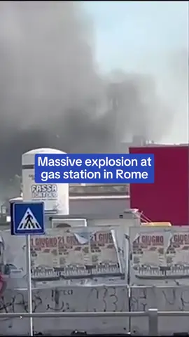 A post by @dailymail on TikTok caption: A huge explosion at a petrol station in Rome this morning has left at least 30 people injured, some with severe burns, and caused residents to flee their homes. Shocking footage showed fires raging and a thick cloud of smoke emanating from the site of the blast at gas station in the Italian capital. One onlooker said 'it looked like hell.' Read the full story on DailyMail.com #fire #explosion #news #rome #italy #europe 